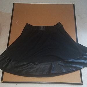 Leather edged black skirt